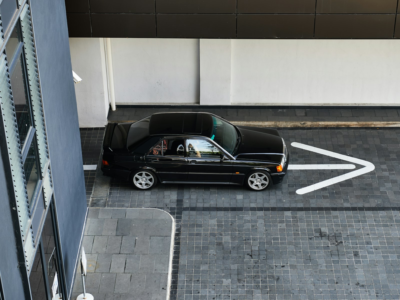 Woman Parked a Rental Car at Hotel