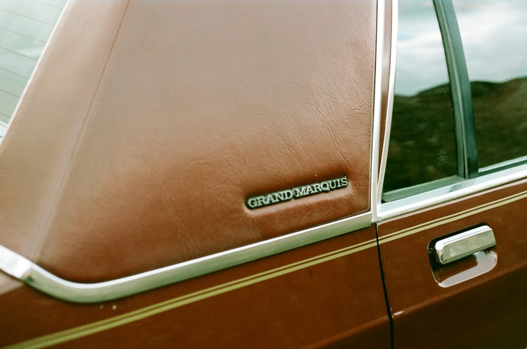 a close up of a car door with a sticker on it