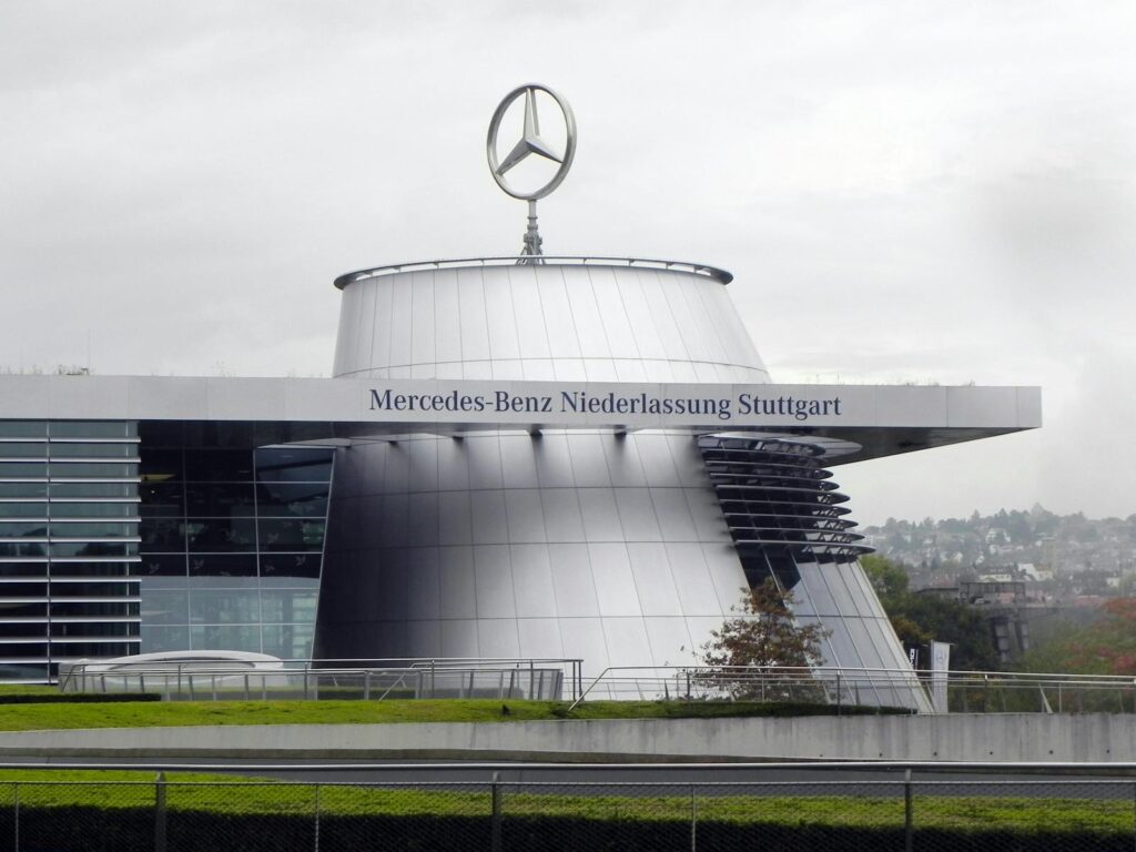 Modern architectural design of the Mercedes-Benz dealership in Stuttgart, Germany, highlighting contemporary urban style.