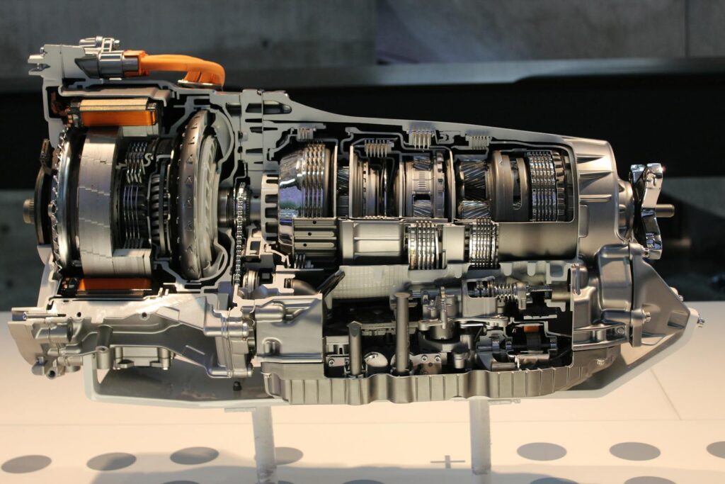 Detailed view of a car transmission cutaway, showcasing internal mechanisms.