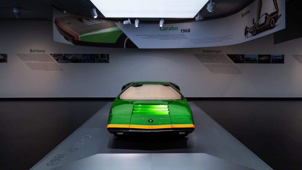 Front view of the classic Alfa Romeo Carabo concept car on display in a museum.