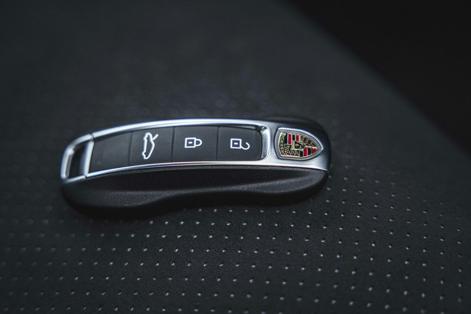 a close up of a remote control on a car