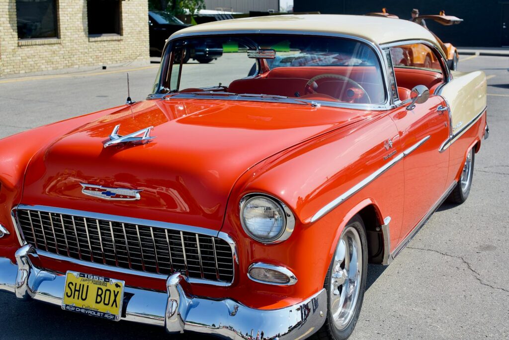 A classic red Chevrolet Bel Air shines under the sun in Winnipeg.