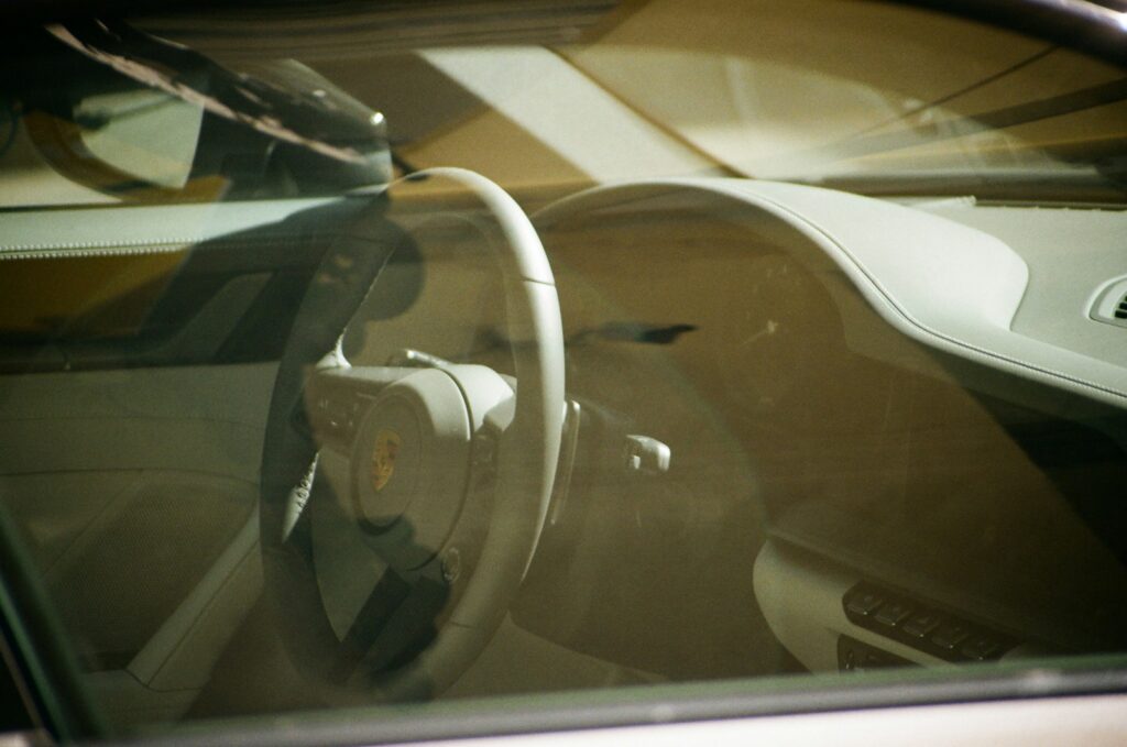 the interior of a car with a steering wheel