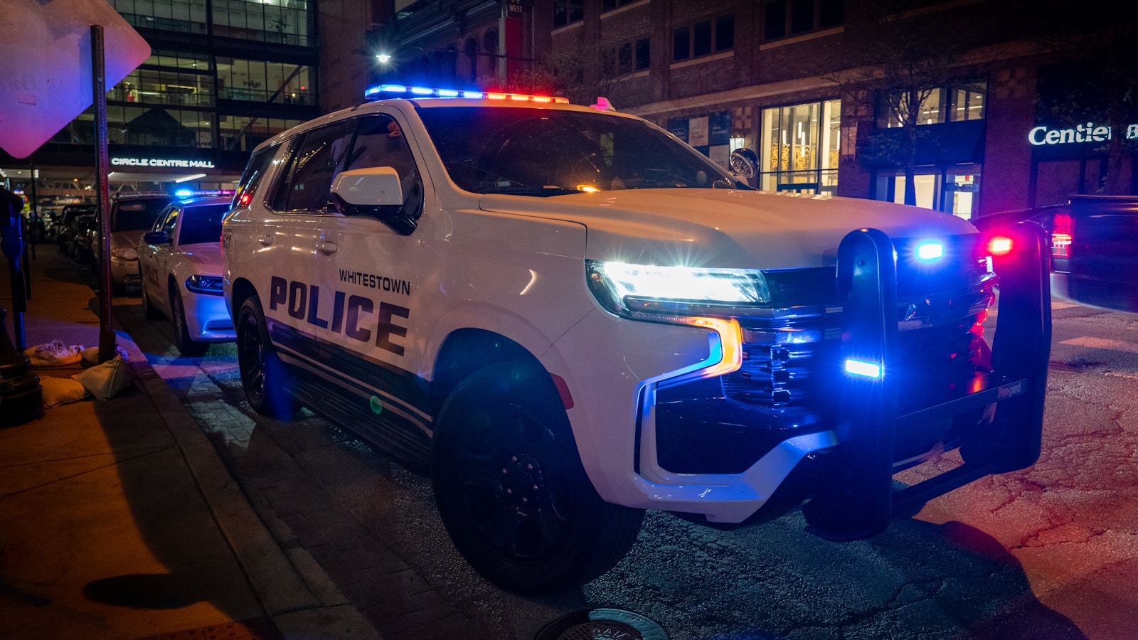 A police truck parked on the side of the road