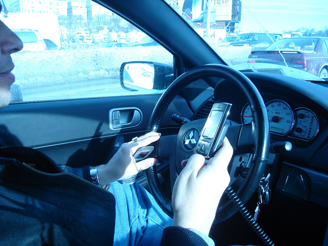 Motorists Could Face $200 Fines Under a Strict Hands-Free Driving Law That Bans Touching Phones While Behind The Wheel