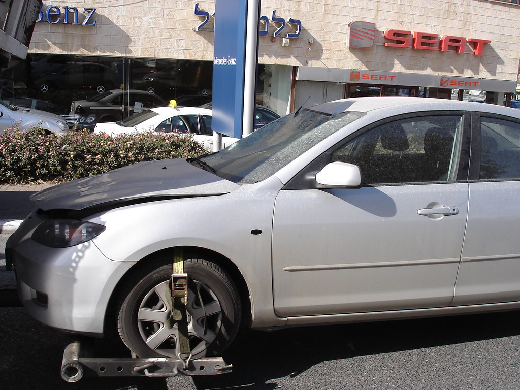 I Took My Car in for Brakes, and the Shop Test-Drove It and Crashed It. Who Is Responsible for the Damage?
