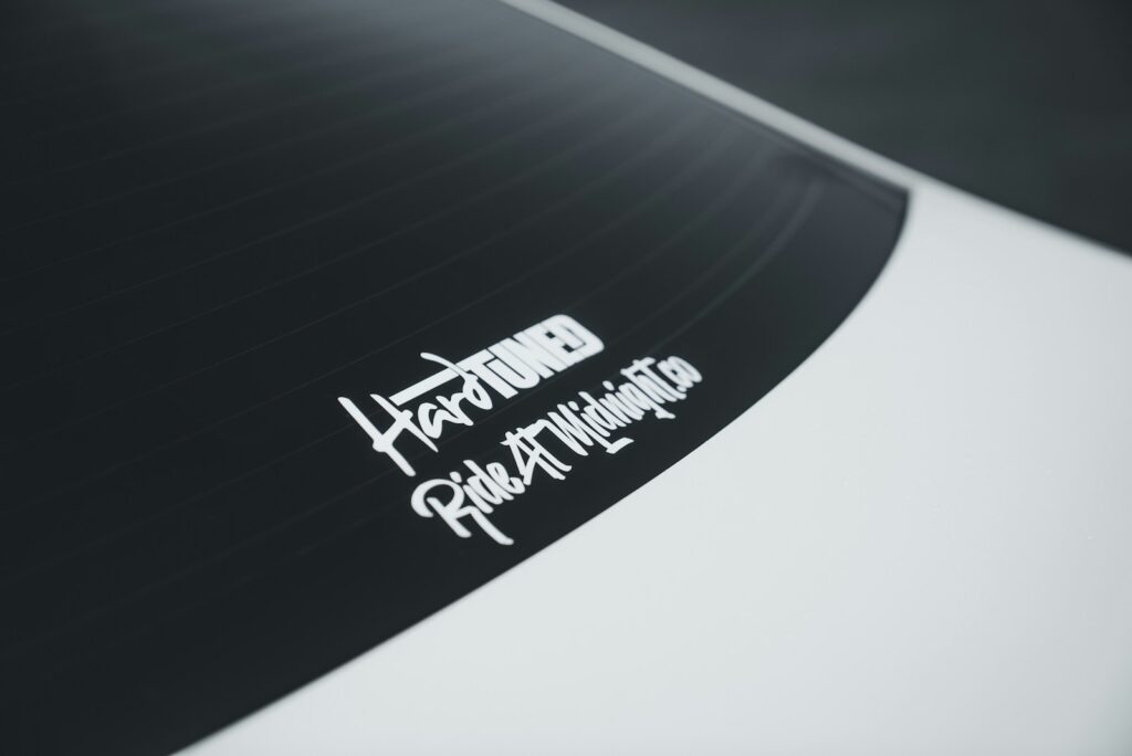 A black and white surface with a sticker.