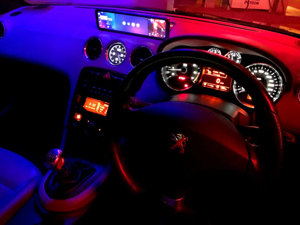 black and red car steering wheel