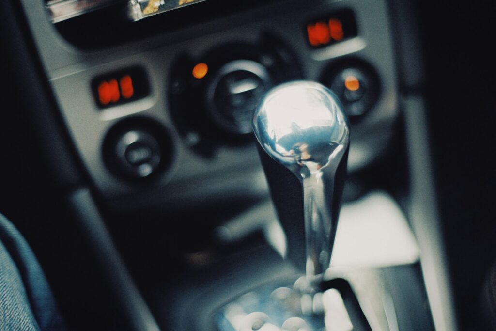 a close up of a car's gear stick