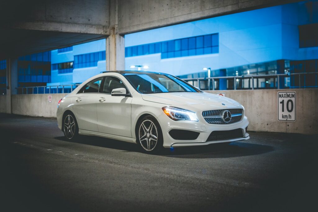 silver mercedes benz coupe parked on parking lot