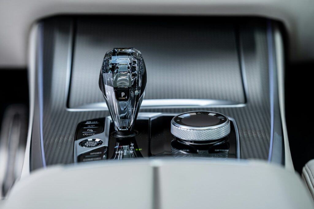 a close up of a car radio with a remote control