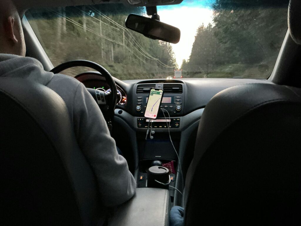 Driving on a road through trees with trees