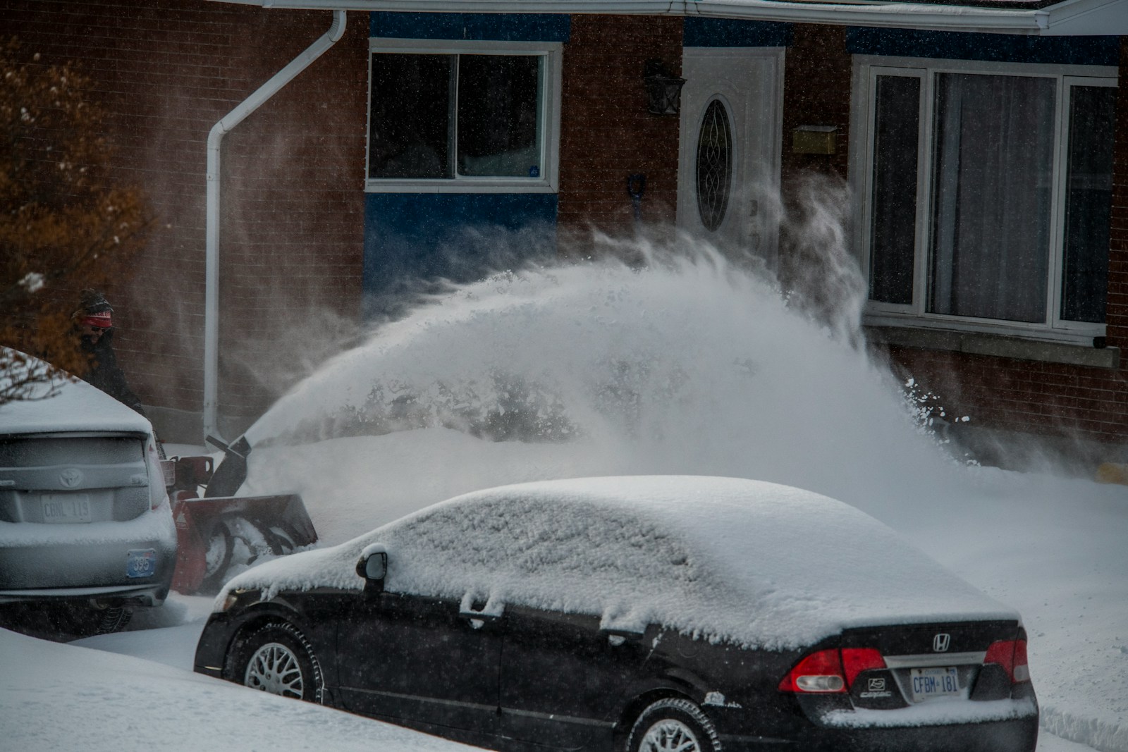 black coupe on road near building during daytime