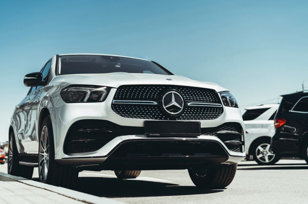 a black car parked on pavement