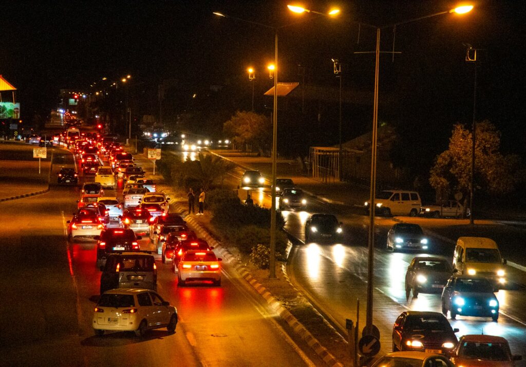 a bunch of cars that are sitting in the street