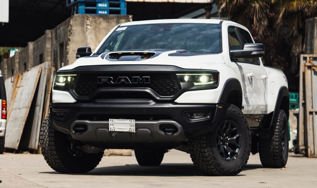 a white truck parked in a parking lot