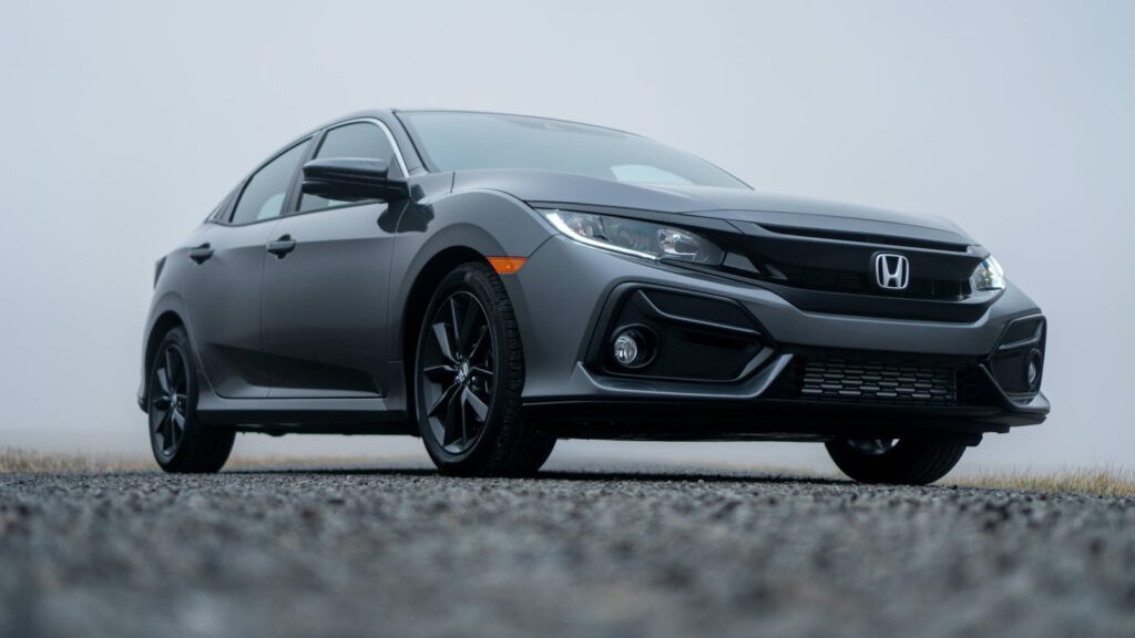 A sleek Honda Civic parked on a misty day in Fort Wayne, Indiana.