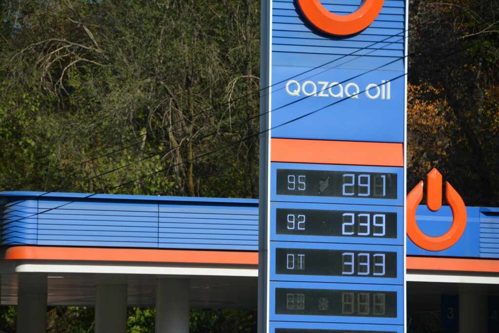 Gas station price board with qazaoil logo