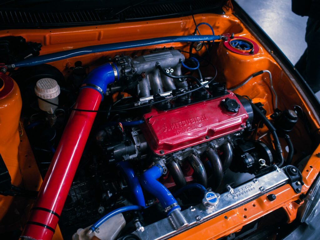 a car engine with red and blue