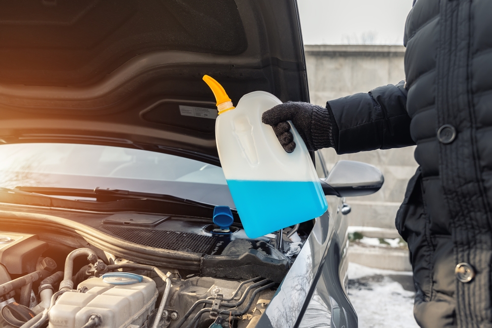 Driver Questions Coolant Flush After Green Fluid Appears in Tank Issue