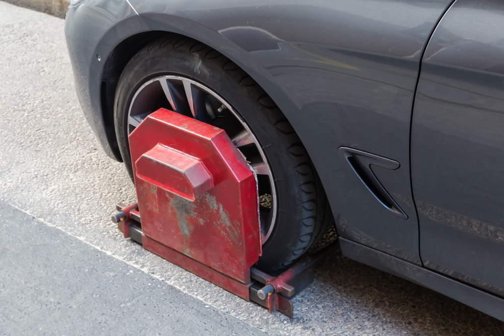 Woman Says Her Car Was Booted in Her Own Apartment Lot Because Management Entered One Digit Wrong in the Parking System