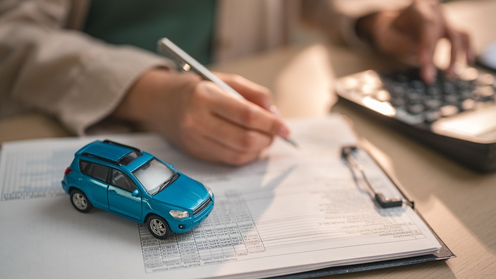 7 Sneaky Fees Dealerships Slip Into Contracts That Most Buyers Don’t Catch
