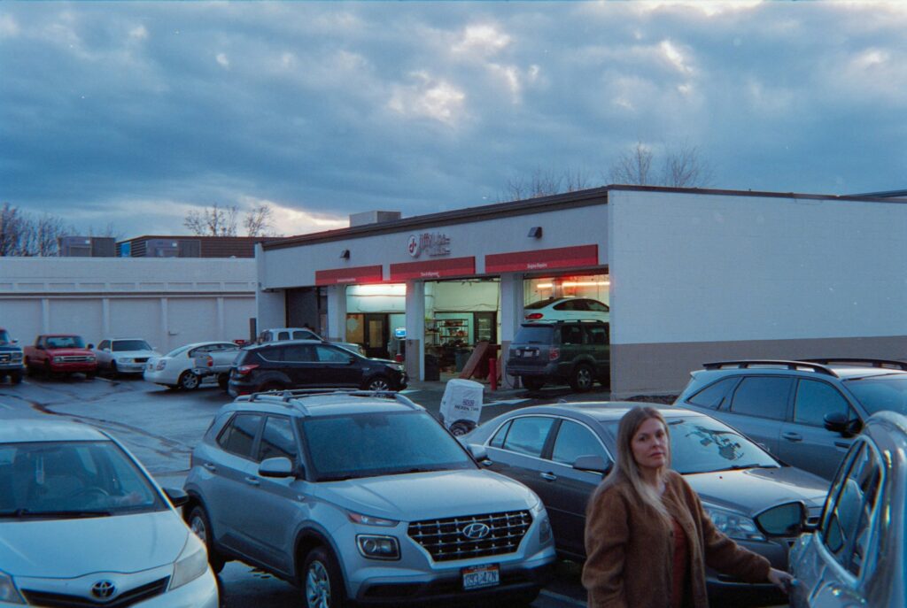 Cars parked in a lot outside a service center