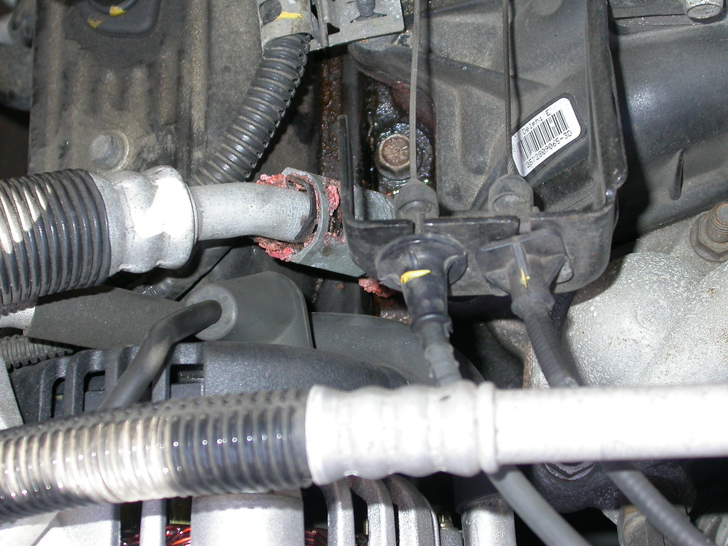 Customer Who Asked for a “Quick Look” at a Coolant Leak Got a Call Saying the Tech Found Coolant Pouring From the Block — The Drain Plug Had Been Cracked Loose to Justify It