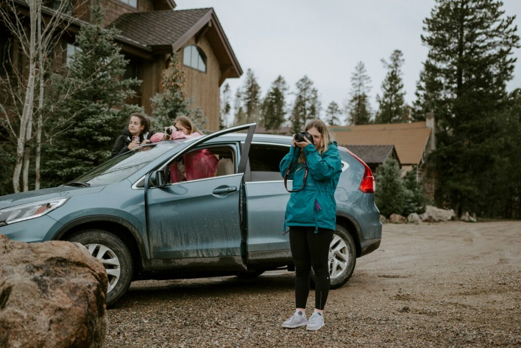 woman in blue jacket standing beside woman in blue jacket