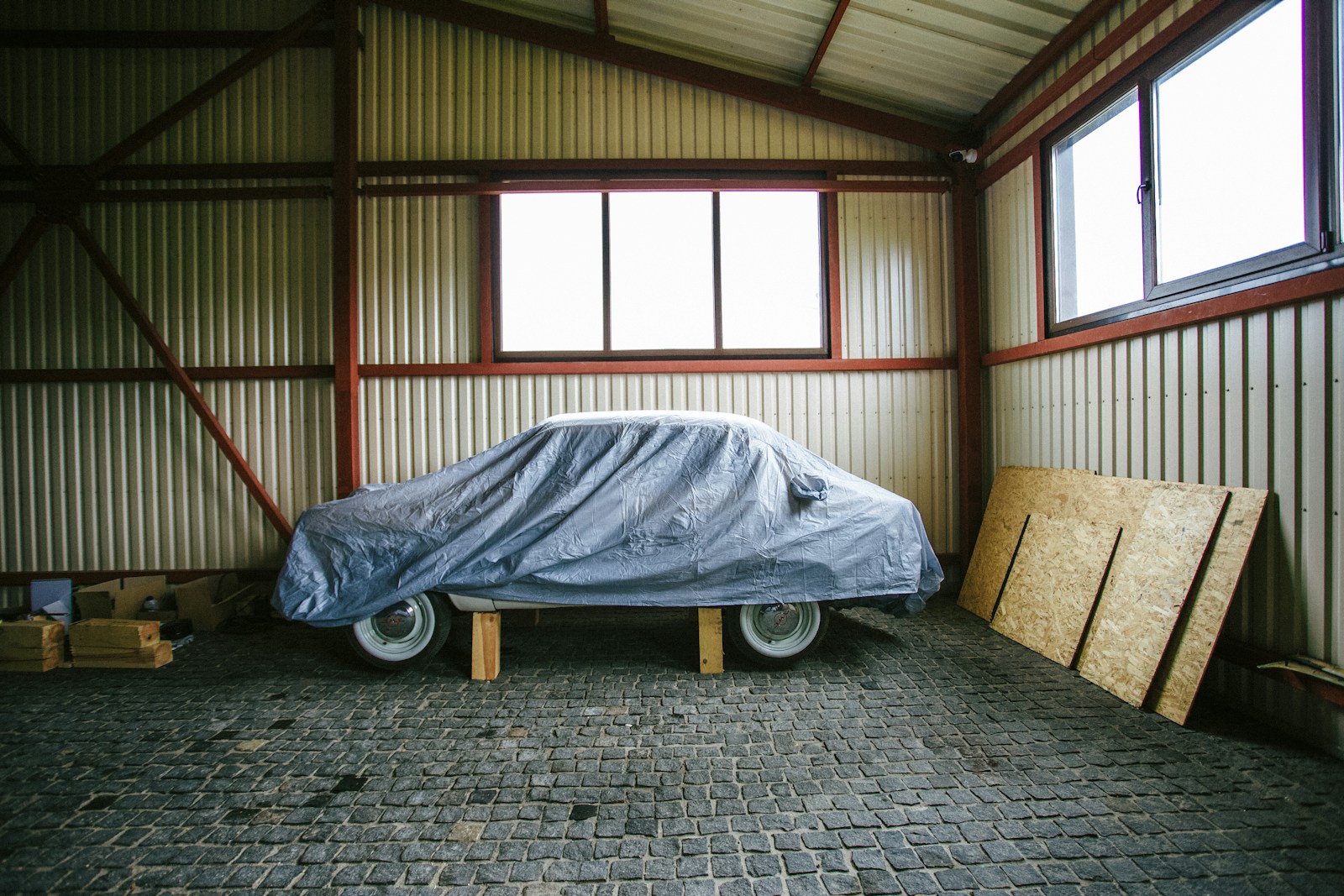 Man Says His HOA Fined Him For A Covered Project Car, But Ignored The Neighbor’s Rusty Boat And Dead SUV For Years