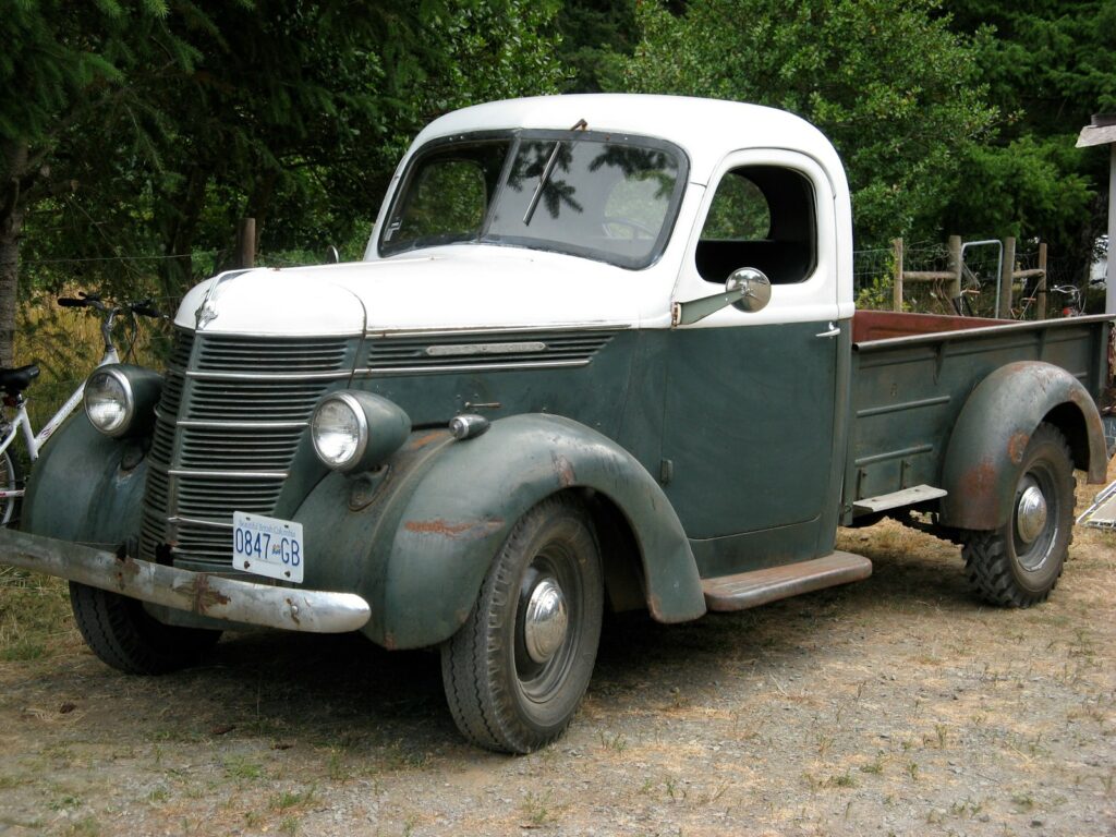 parked white and grey pickup truck