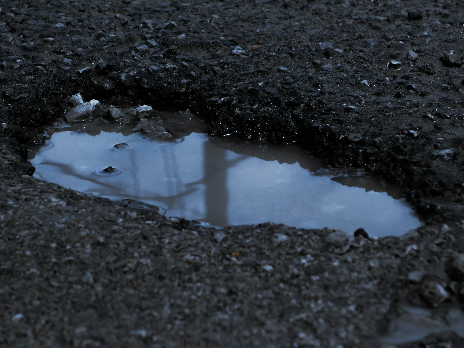 Driver Says He Hit A Pothole, Blew Two Tires, Bent A Rim, And The City Told Him “Road Conditions Are Your Responsibility”