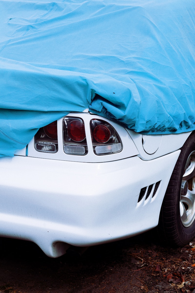 Wife Discovers Her Husband’s “Cheap Beater” Is Actually A $42,000 Auction Car He Hid Under A Car Cover At Work