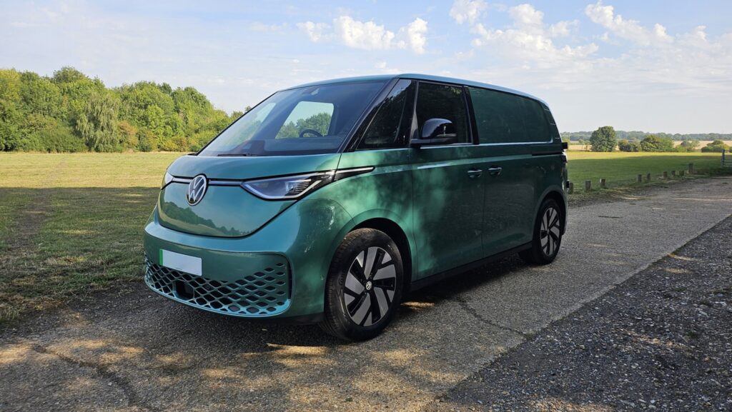 Green volkswagen id buzz van parked outdoors
