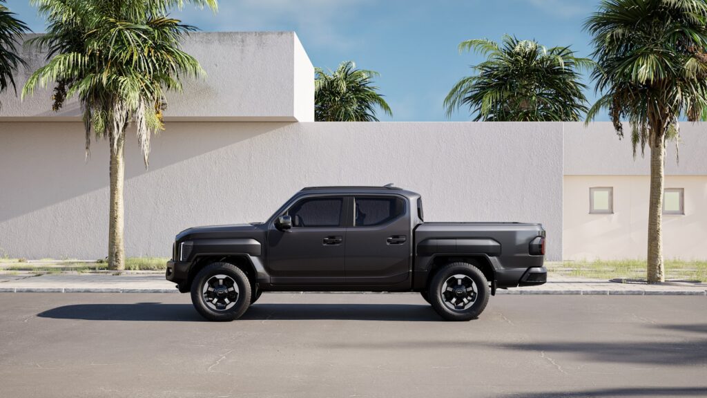 A black truck is parked in a parking lot