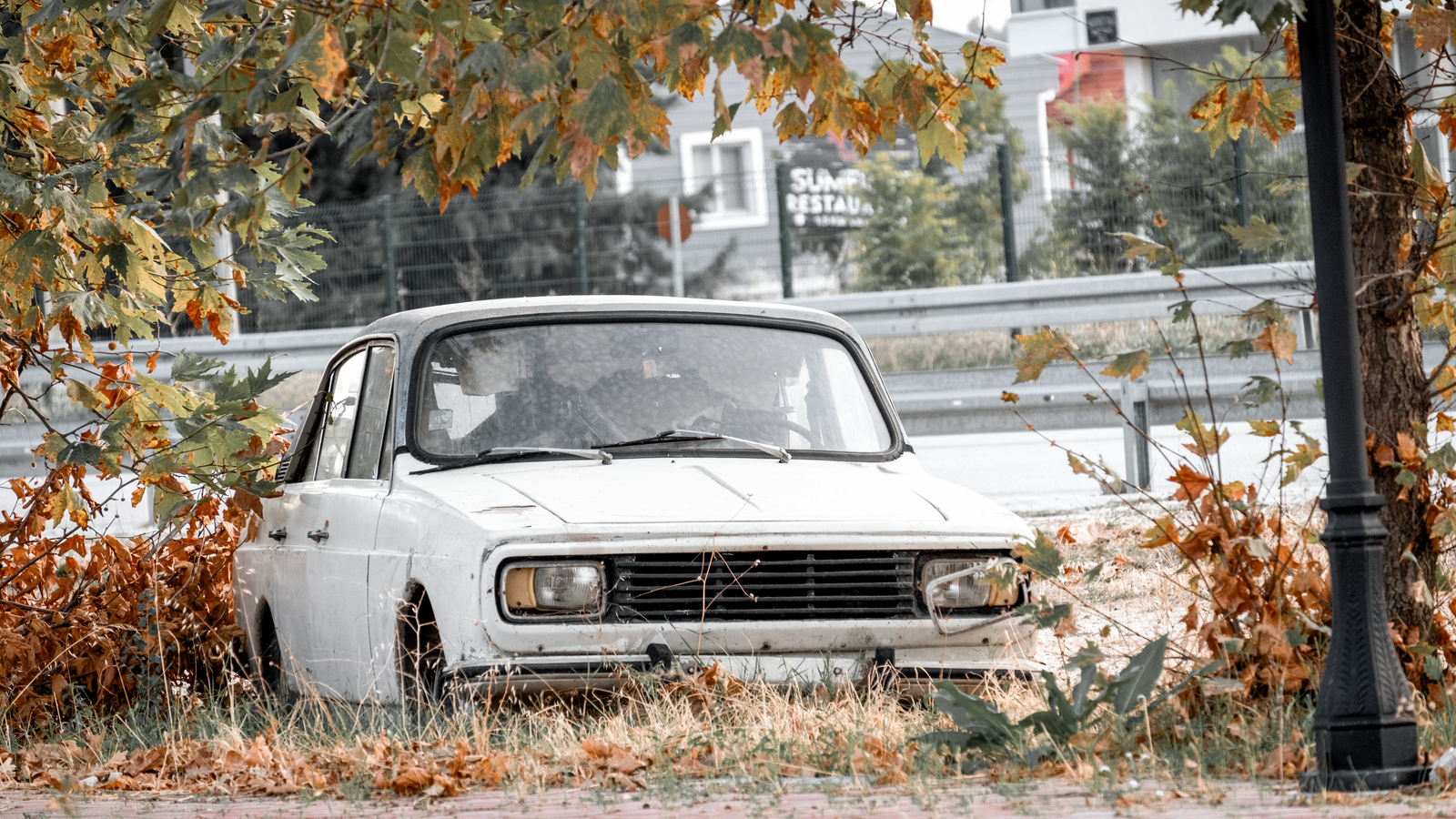 Retro vehicle nestled among autumn leaves in Çeltikçi, Burdur, Türkiye, exuding a classic vintage charm.