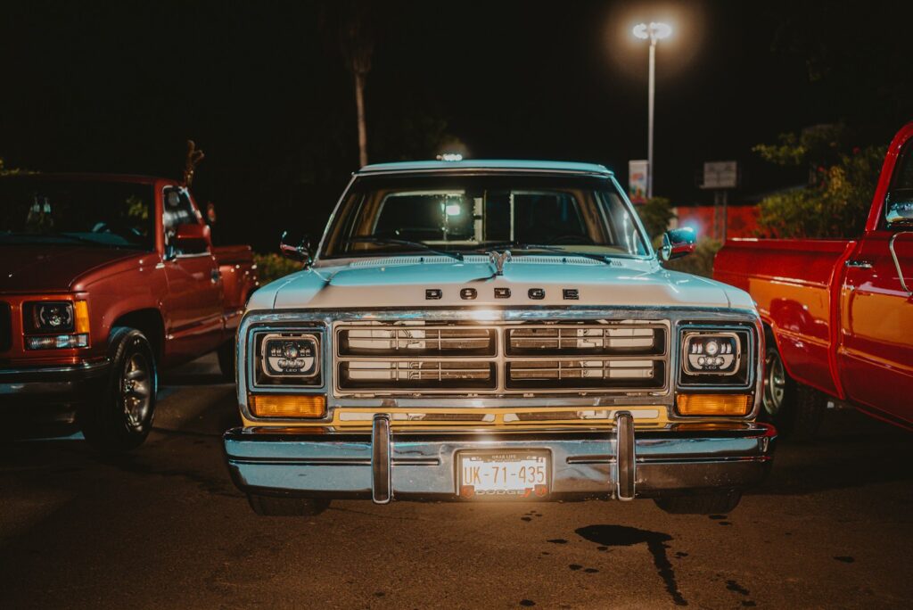 Vintage dodge pickup truck parked at night