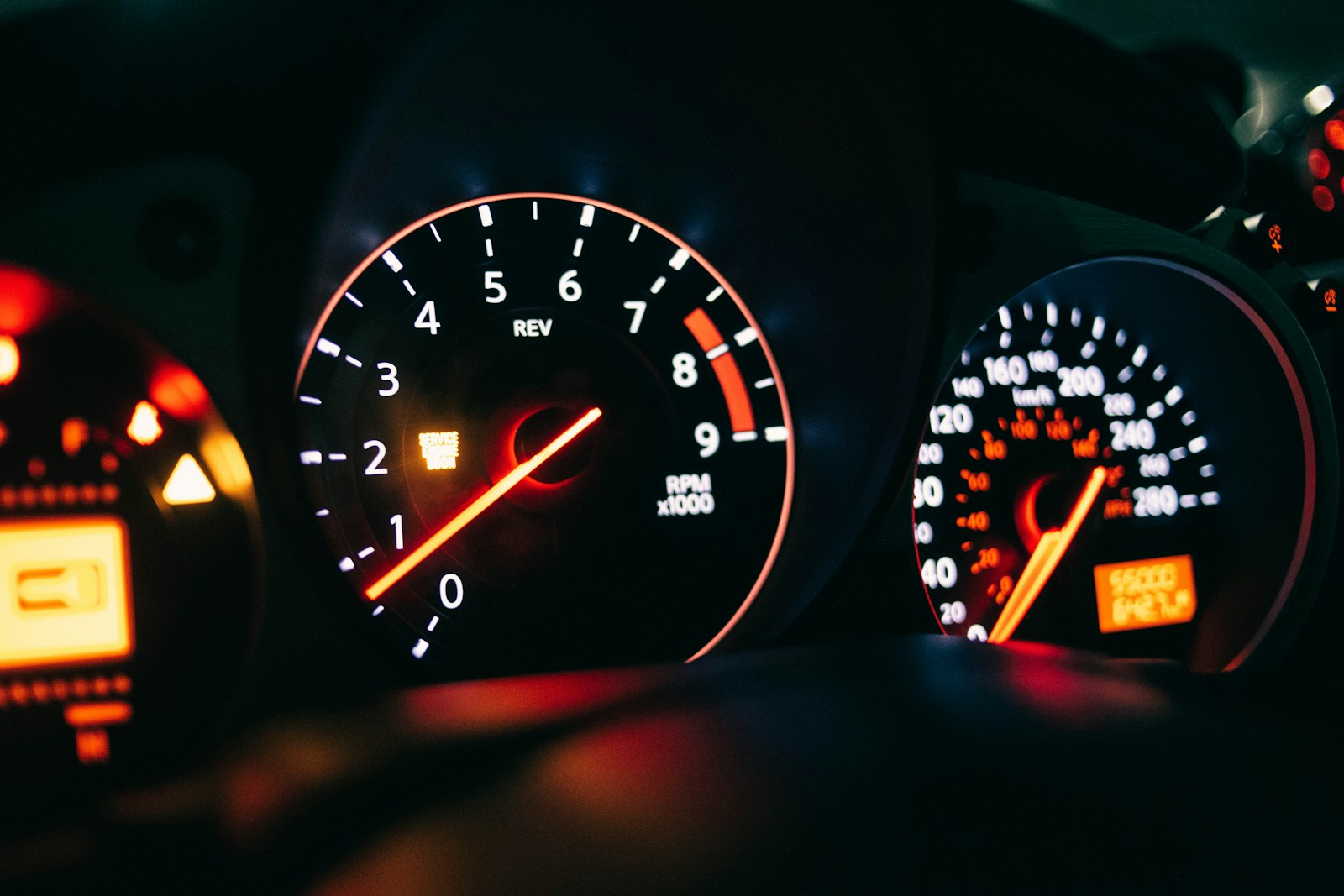 a close up of a speedometer in a car
