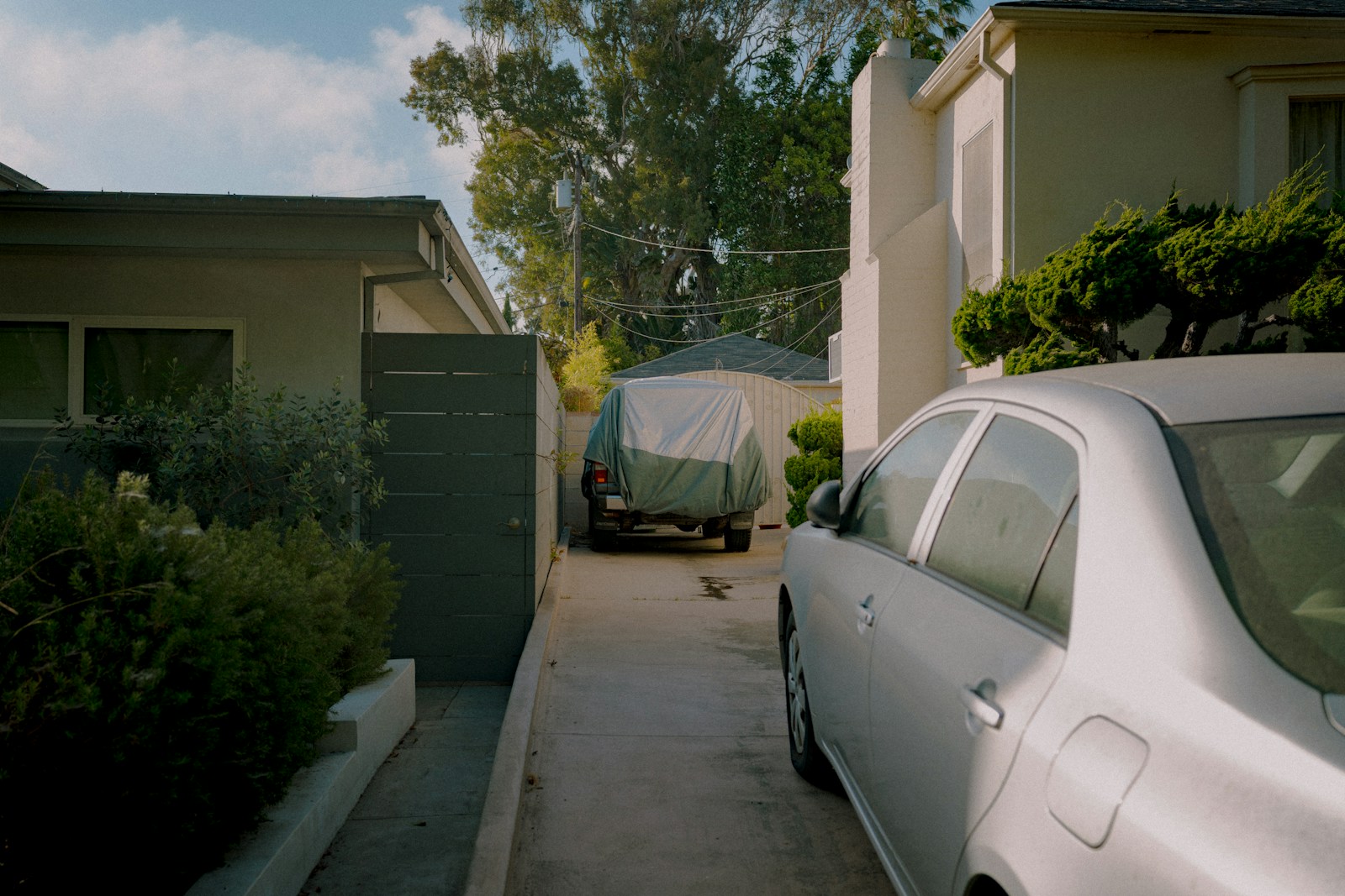Neighbor Blocks the Same Driveway for Months and Laughs Off Every Request to Move, Then Leaves for Vacation and Returns to Find the Car Towed After It Prevented an Ambulance From Reaching the House