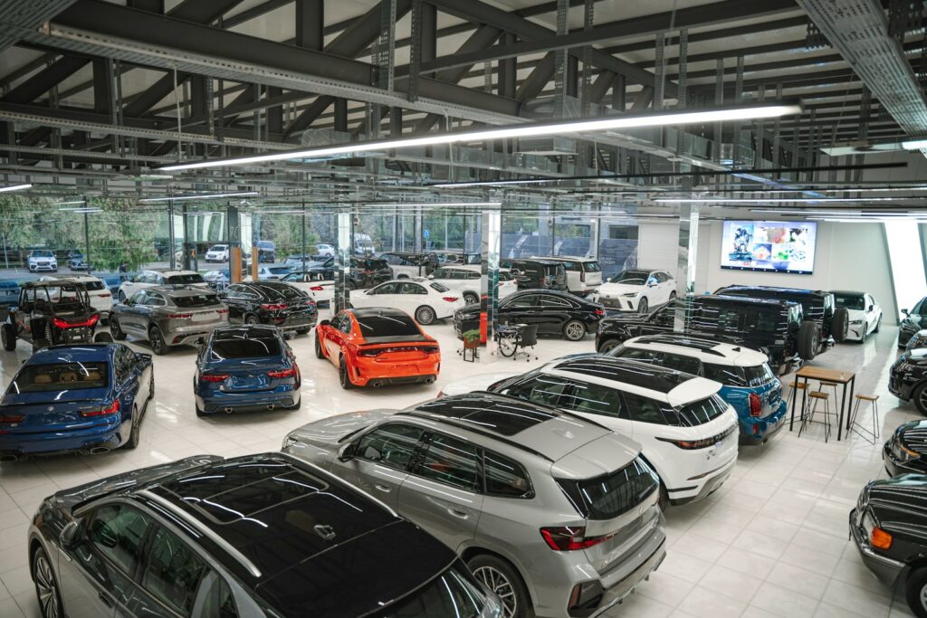 a bunch of cars are parked in a garage