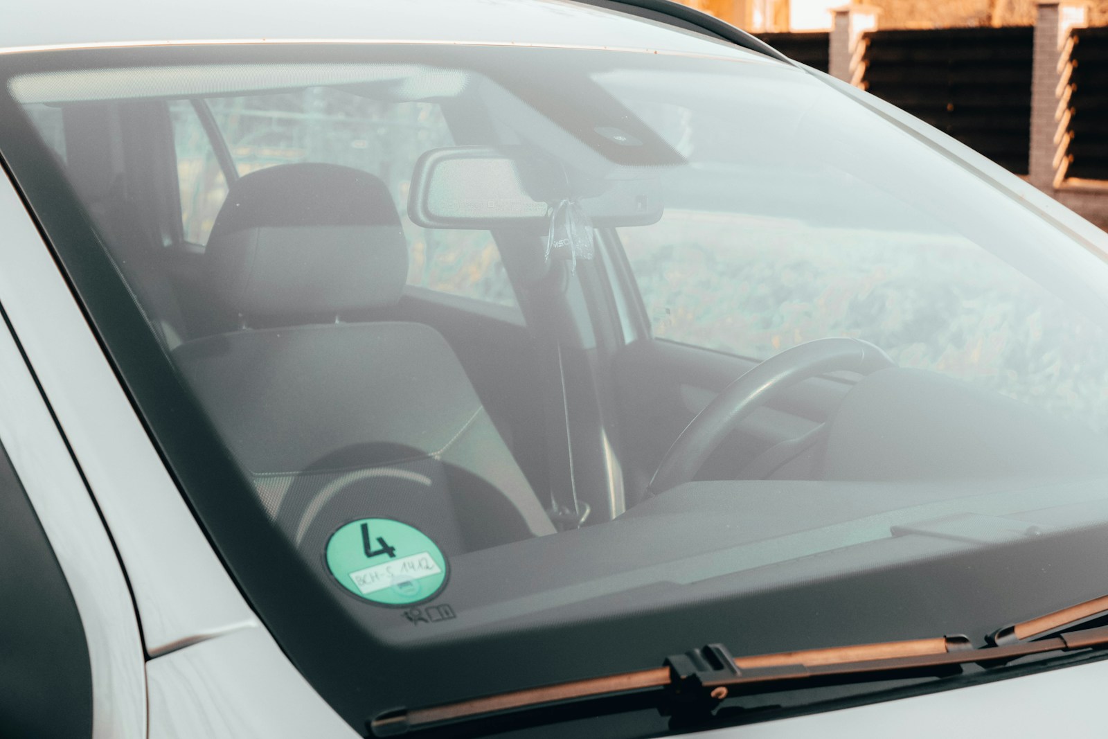 Taped Right Next to the Federally Required Window Label, a Second Sticker Can Legally Add Thousands of Dollars to a New Car’s Price With Almost No Regulation Stopping It