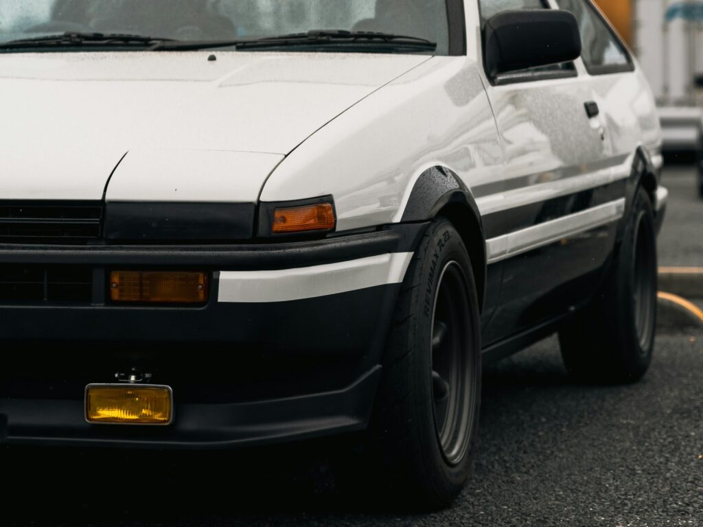 White sports car with black accents and white trim
