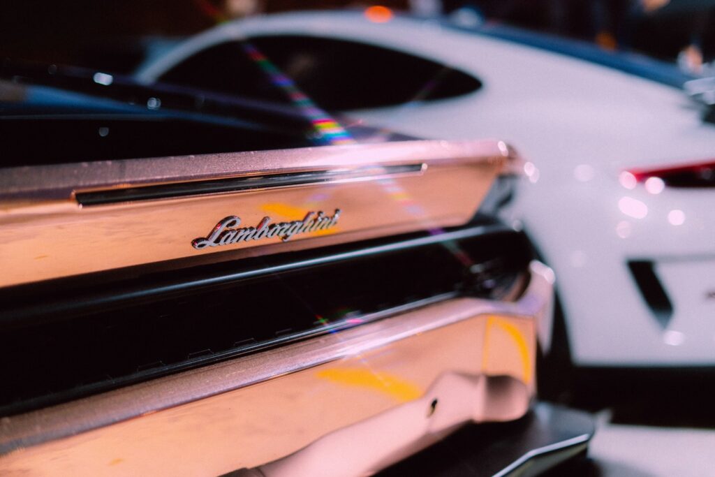 white and black car in close up photography