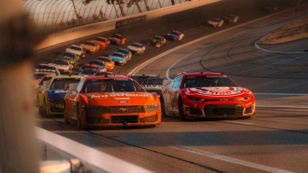 Race cars competing on a track during a race