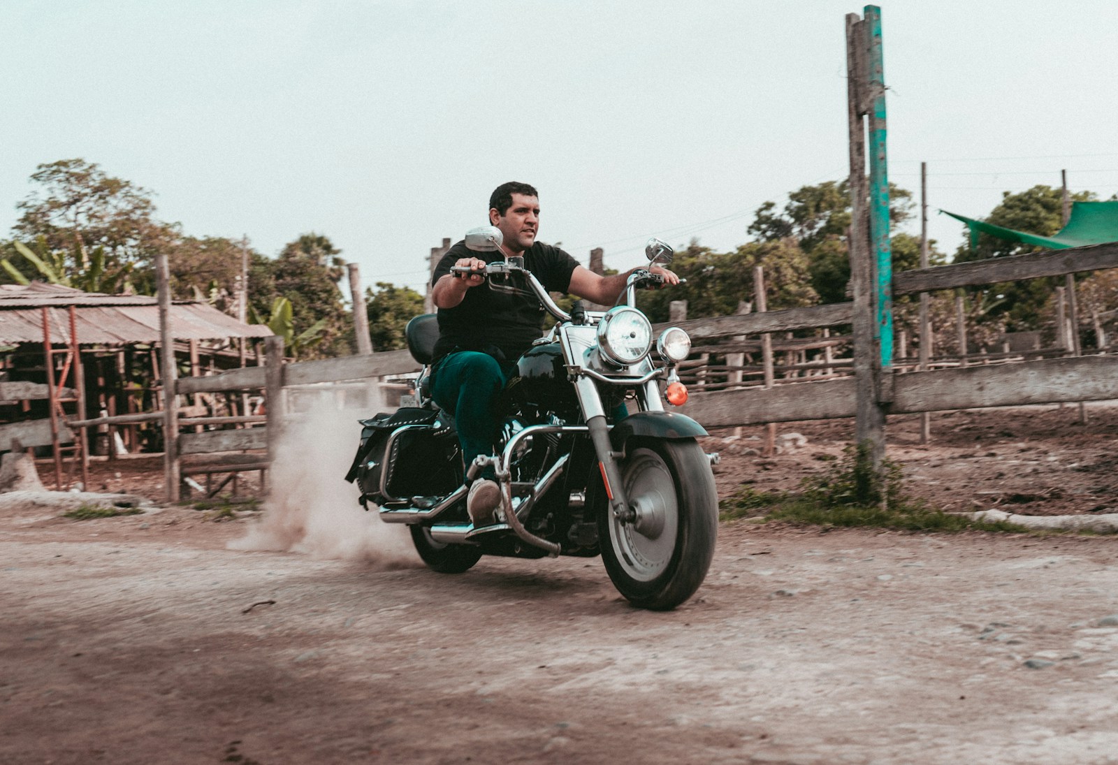 a man riding on the back of a motorcycle